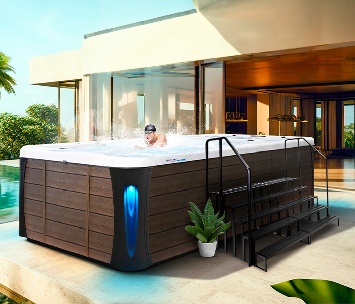 Calspas hot tub being used in a family setting - Pueblo